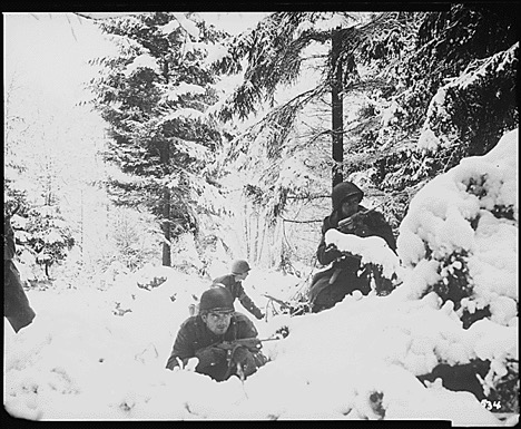 In 1945, army soldiers are fighting from their foxholes in Belgium to repeal the German army advance.