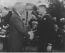 navy corpsman and medal of honor recipient bob bush receiving the MOH from President Truman.