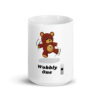 Army Warrant Officers are known as Wobbly Ones or Wojgy bear. This 15 oz. white coffee cup is for a new WO1.
